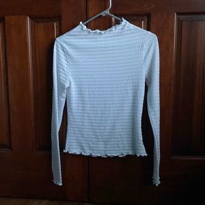 White long sleeve fringed top